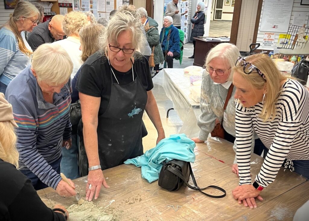 art-class-participants-engaged-in-painting-activity